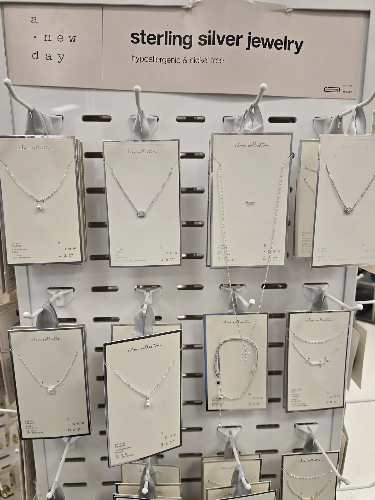 Target sterling silver jewelry hypoallergenic nickel free 货架标识,下方纯银项链挂卡